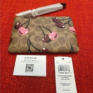 ❤️❤️❤️NEW Coach wristlet/wallet with cherry print ❤️❤️❤️